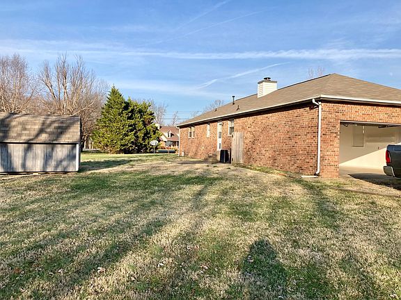 Great yard, storage building. House is on cul de sac. Full double garage