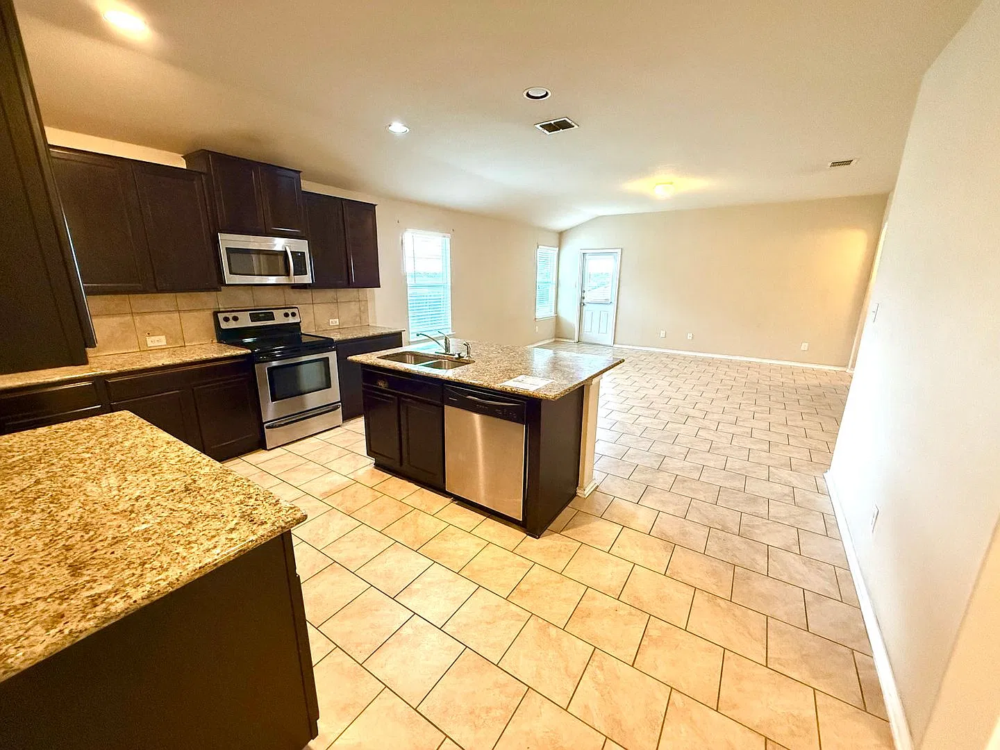 Inviting 3-Bedroom Home with an Island Kitchen & Large Fenced Backyard! — Photo 4