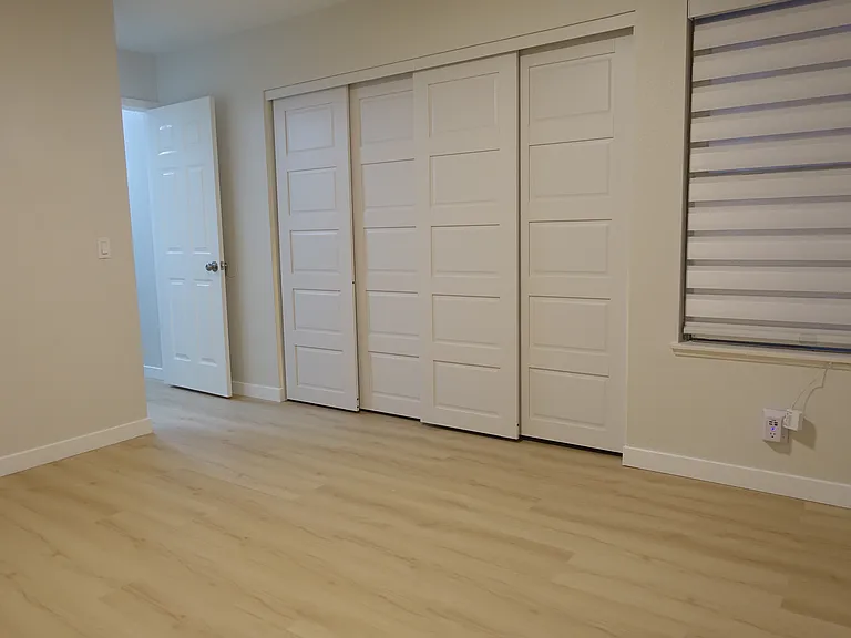 Bedroom #2: Large room with ensuite bathroom. Generous closet with 4-sliding doors. Window with cordless cloth blind and filtered light.