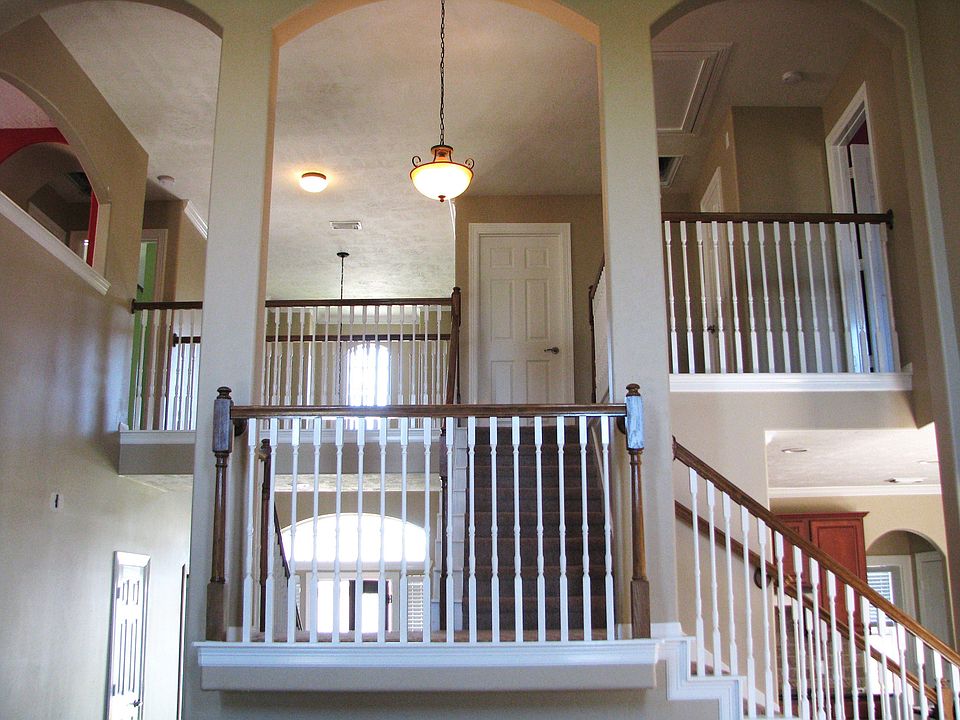 View from Living looking toward upstair. Dual Staircase.