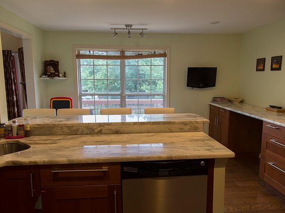 Upgraded kitchen with high-end granite and stainless steel a