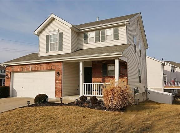 Located on a corner lot in the Hyland Green community.