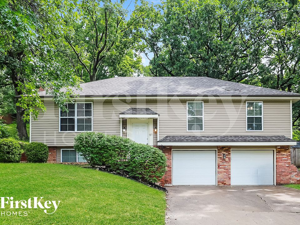 1st image of 5905 NW Whispering Oaks Ln
