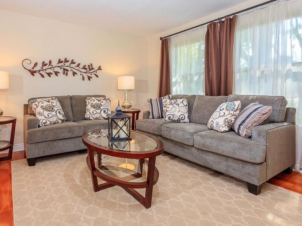 Inviting, comfortable and bright formal living room