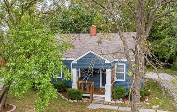 Nice, landscaped yard. Parking for 2-3 people in back easily accommodated.