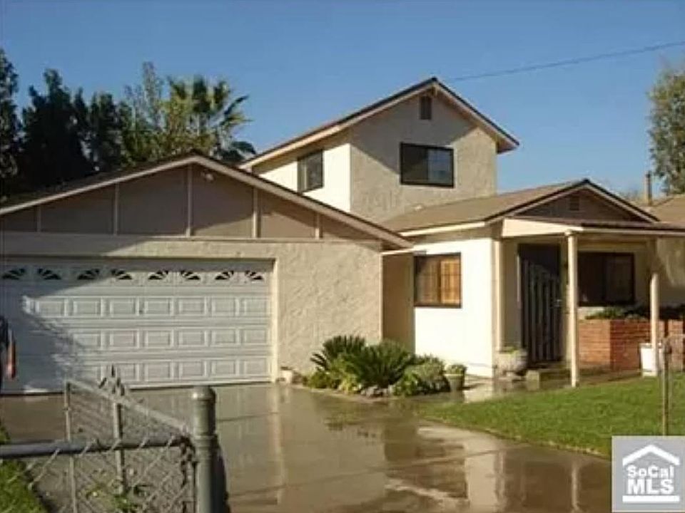 XL Two-Car Garage with additional parking in driveway and private street parking