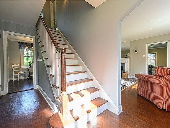 Beautiful front staircase and foyer