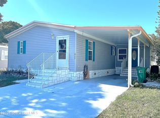 622 Dolphin Cir, Barefoot Bay, FL 32976