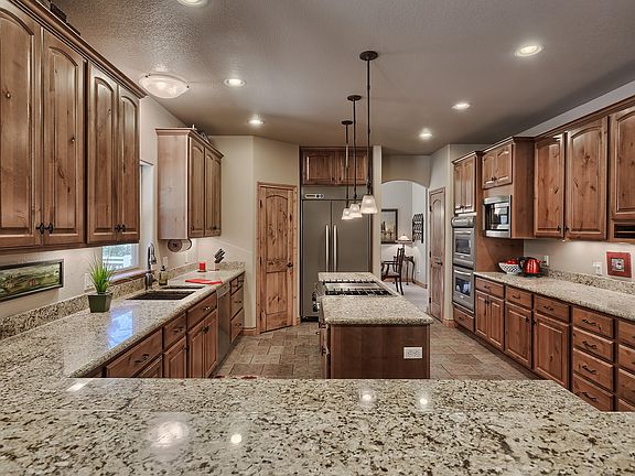 Granite, stainless appliance