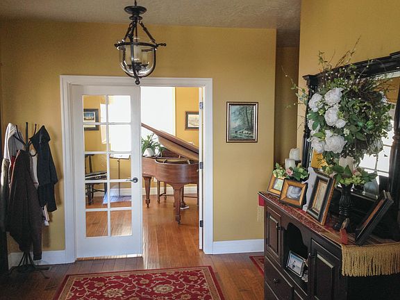 Entrance and Piano Room.