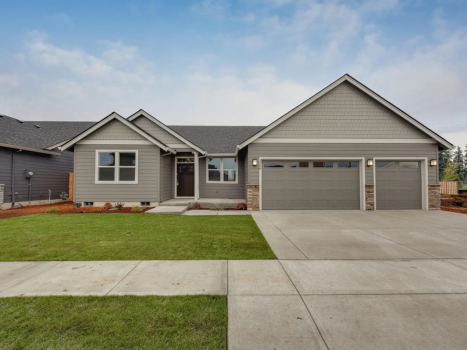 Cascadia 3-Car Plan, Dugan Estates photo 1