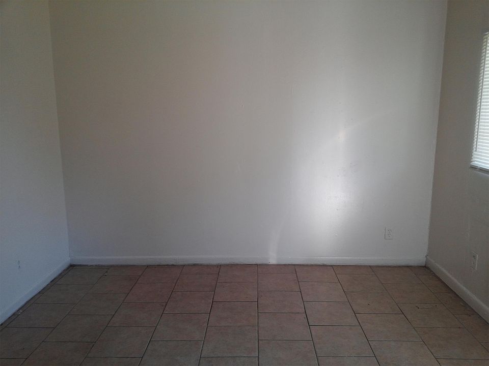 Living room is larger than picture shows. Can fit sofa,love seat & small entertainment center