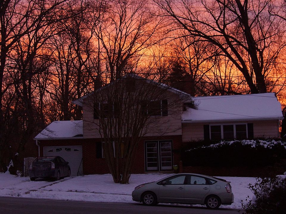 House in Winter with sunset