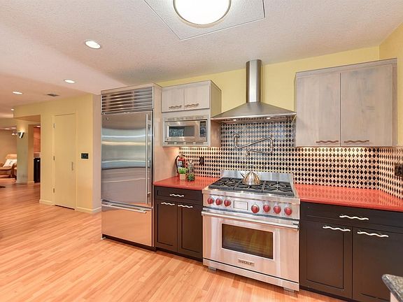 Custom gourmet kitchen with Wolf range and SubZero refrigeration