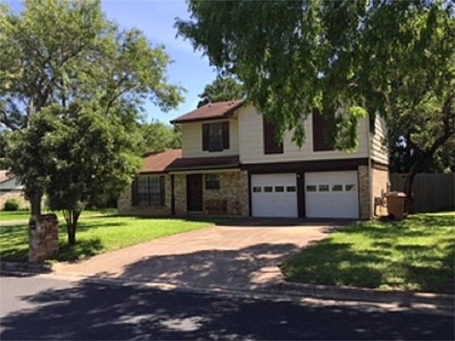 Welcome home to this corner lot located at 2801 Jorwoods Drive in Cherry Creek!