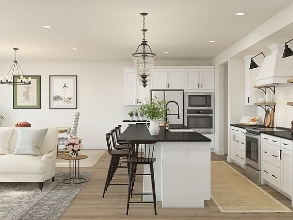 Kitchen with granite island and countertops