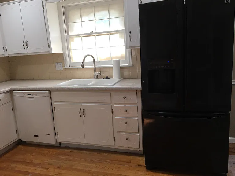 French door refrigerator with ice and water in the door