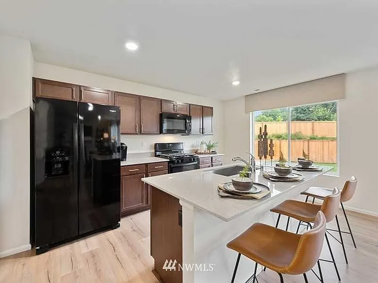9119 Alyssum Ln SE — Photo 5