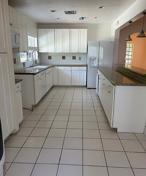 4141 Irving Pl — Photo 15