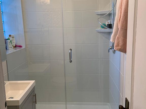 Updated bathroom with brand new walk-in shower.