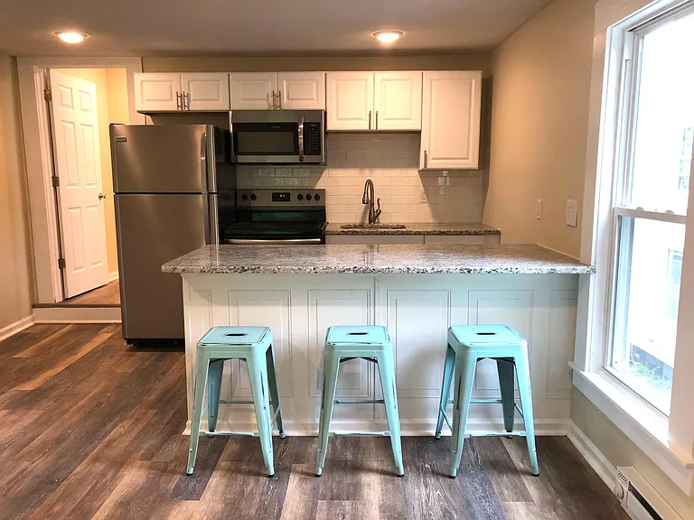 110 Charles Ave — Photo 2