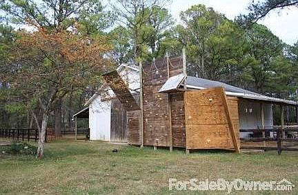 Rock Climbing Wall
						:
						There is a rock climbing wall behind the bard. Great for the kids to play on.