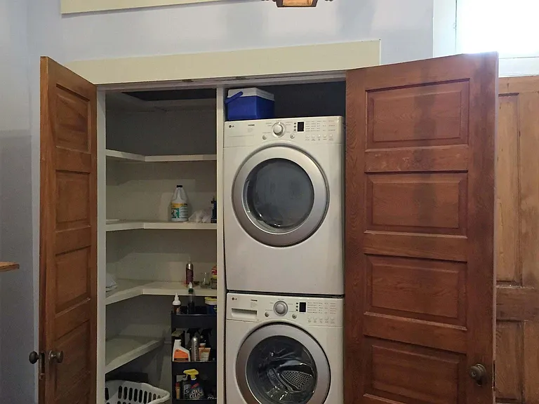 Laundry/closet located in downstairs guest bedroom/home office