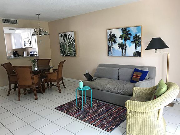 Open concept floor plan unites the living room, dining room and kitchen.