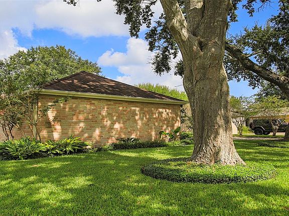 You will enjoy the lush landscaping and mature trees surrounding the home. The automatic sprinkler system in front and backyard will keep it beautiful year round.
