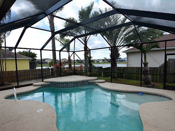 Screened pool with lake view