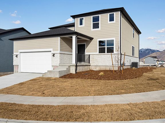 The Bryce floorplan exterior image taken at a Meritage Homes Community in Tooele, UT.