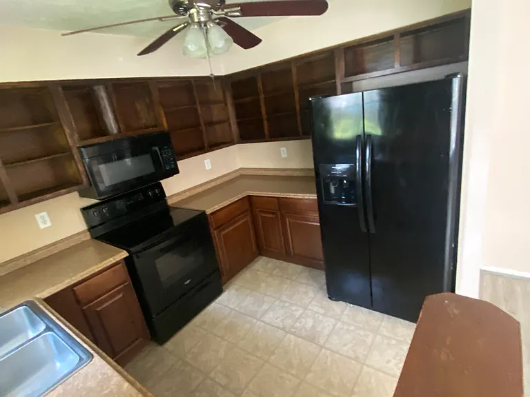 Kitchen with black appliances