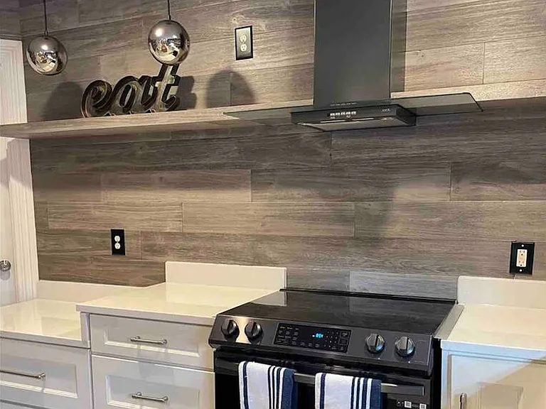 Kitchen area with updated appliances