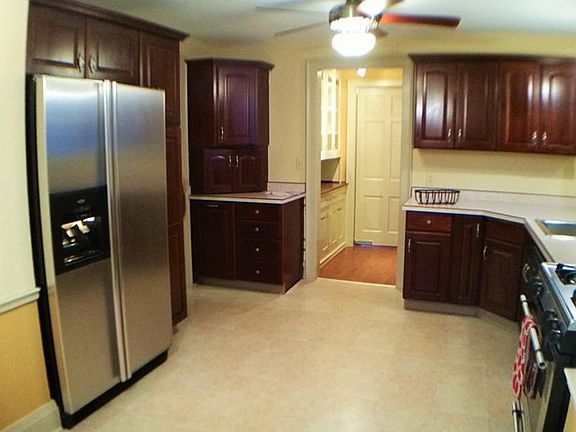 Remodeled eat in kitchen leads to a butlers pantry. The swinging door opens to the formal DR