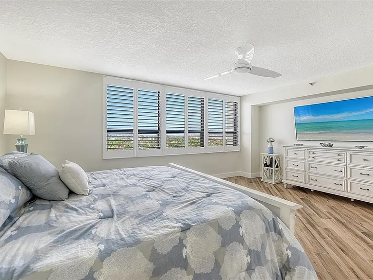 The entire unit is light and bright the primary bedroom included. Large screen TV lots of storage space with dressers and huge walk-in closet.