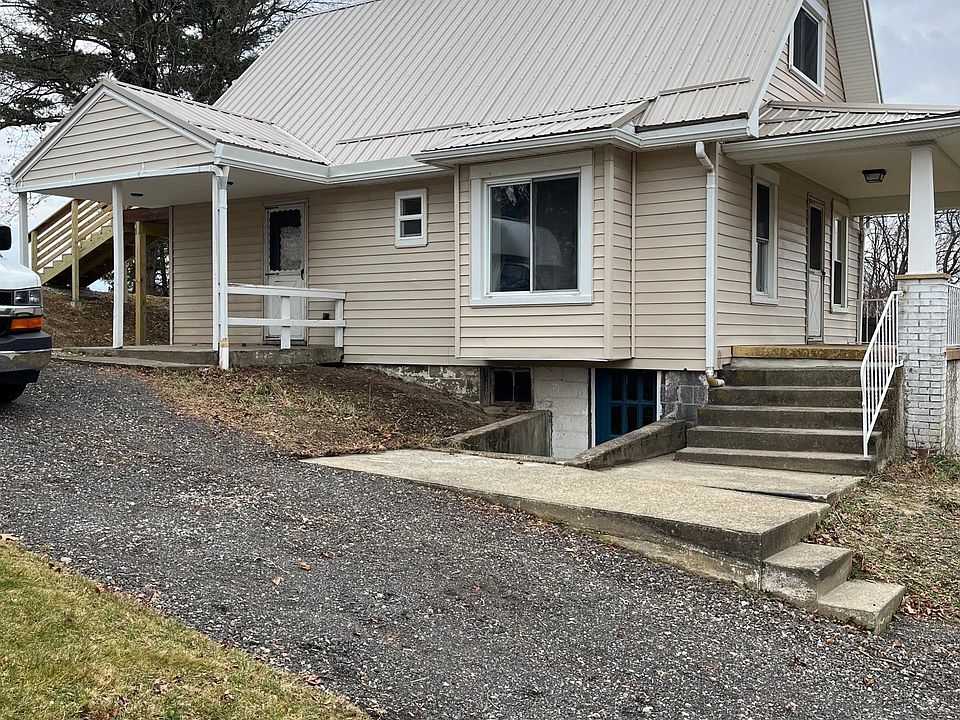 Front and side covered porches. Plenty of off-street parking. Brand new roof, water heater, furnace and air conditioning. Basement is accessible from the outside and has a full laundry area. Equipped with washer, dryer and utility sink.
