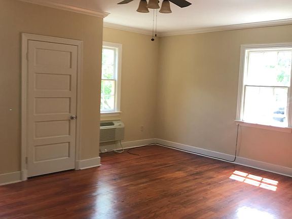 View from entrance showing the 2nd & 3rd windows. There is beautiful light in this unit because it is a corner unit.