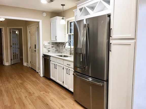 Wine rack over fridge