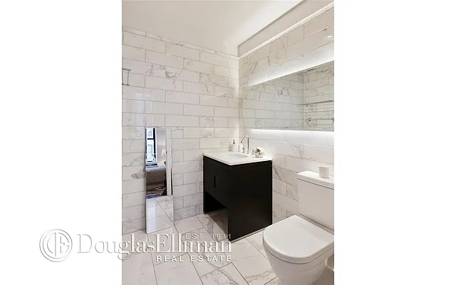 Sold by Douglas Elliman | media 12
