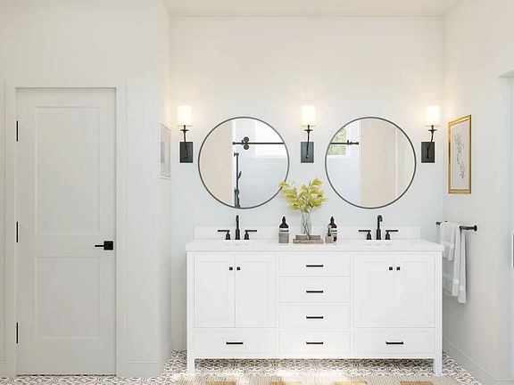 Primary bath with freestanding vanity and matte black fixtures