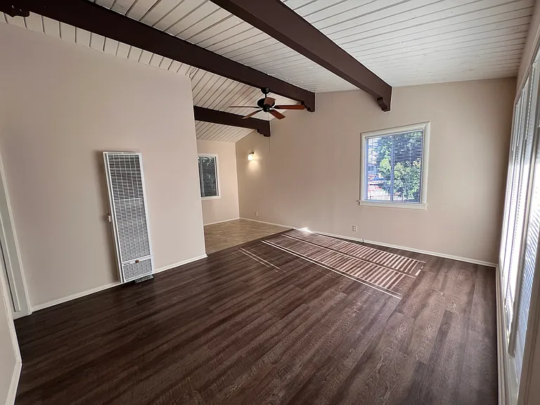 Wide view from the front door. Window to the street.