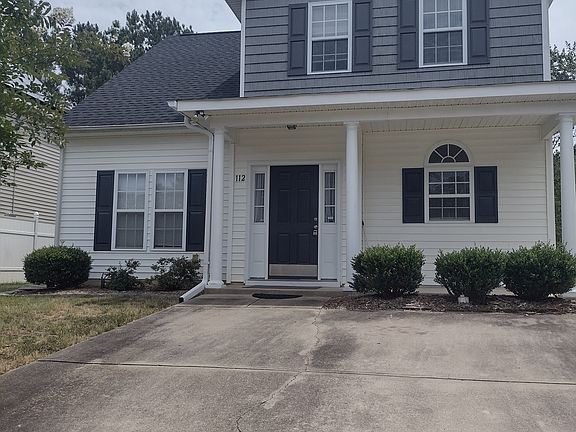 Front Exterior with parking spaces