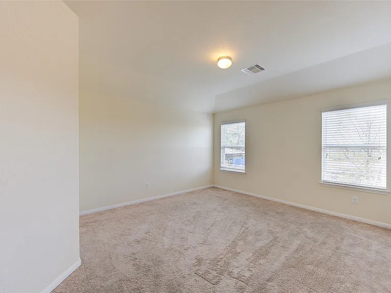 10907 Woodland Leaf Ln — Photo 15