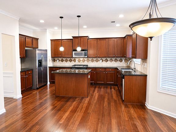 Bright and spacious eat-in kitchen with ample room for everyday dining and entertaining.