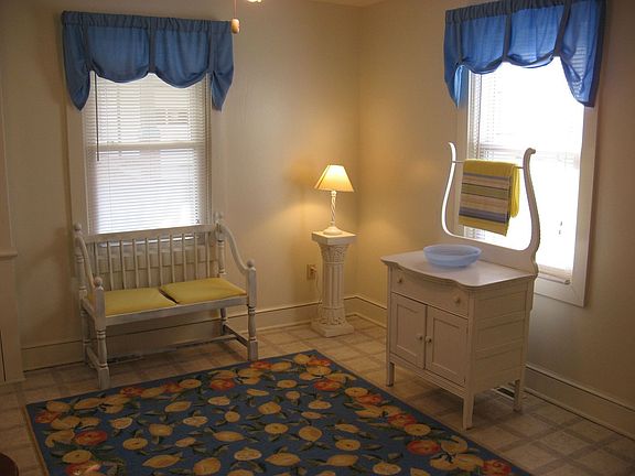 Eat in kitchen with charming built in curio!