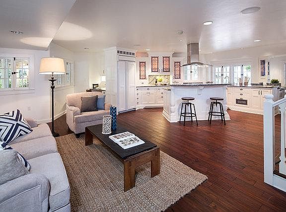 First Floor kitchen with cooking island, sitting area, built in desk/work station and breakfast nook (not visible) with built-in table and storage.