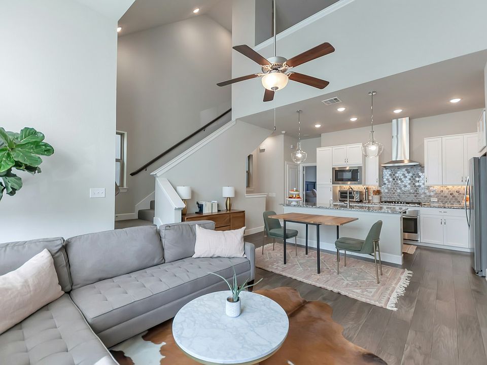 Living area, dining area and kitchen on the 2nd floor; Primary bedroom is also on this floor. Stairs to 3rd floor loft, great for an office, workout area, storage and/or guest room!