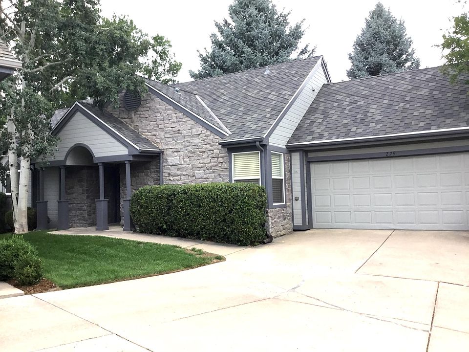 Front entrance with attached two car garage