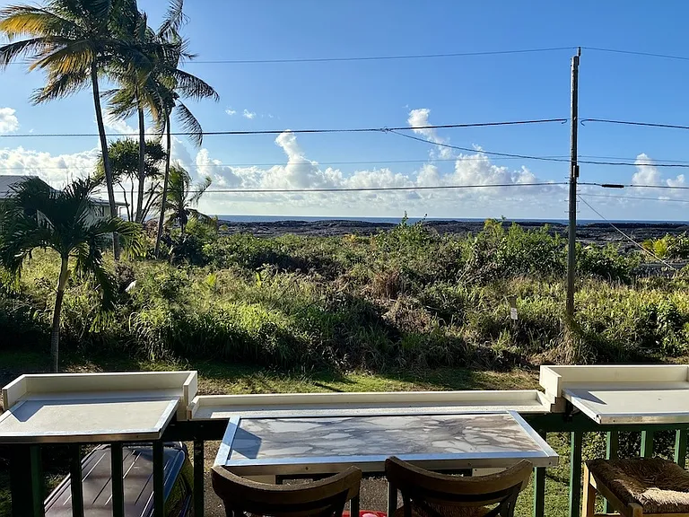 Relax Eat or do Computer work at the folding Lanai stations seating for 4 at the stations