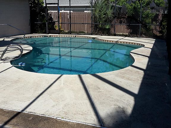Heated screen pool.